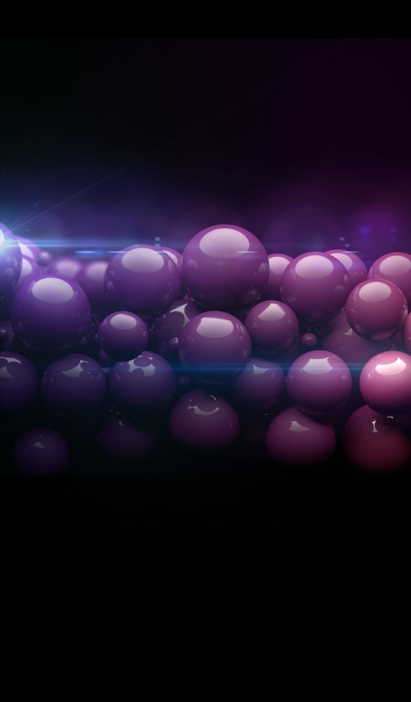 Нить из разноцветных шаров на черном фоне 