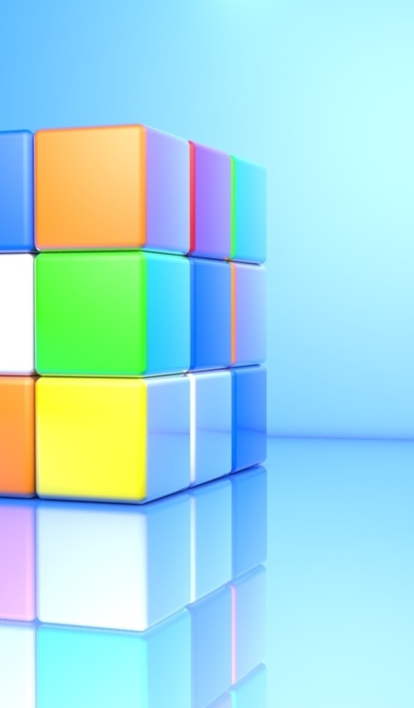 Разноцветный кубик Рубика на голубом фоне 3д графика