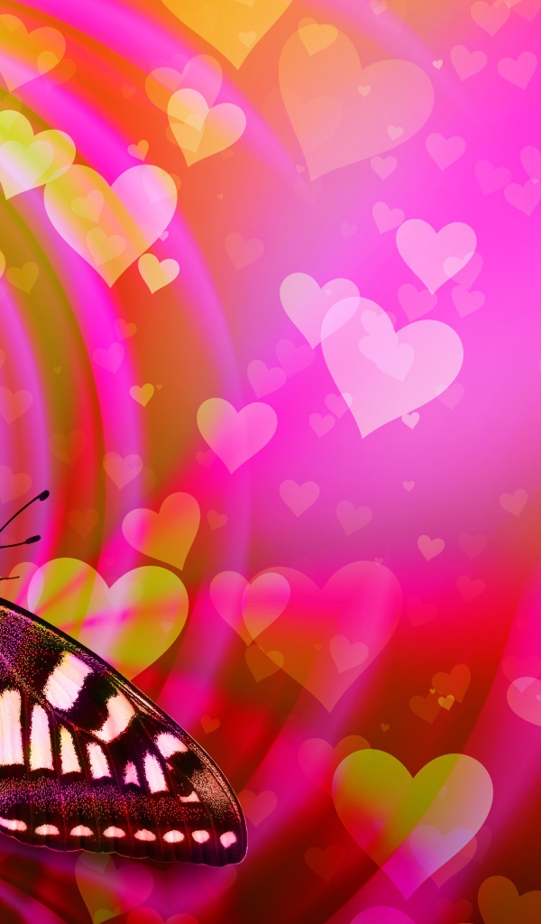 Большая бабочка махаон сидит на розовом фоне с сердечками