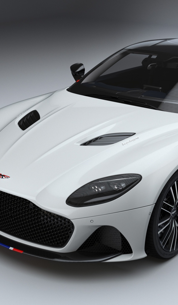 Белый автомобиль Aston Martin DBS Superleggera Concorde Edition 2019 года на сером фоне