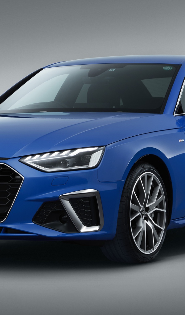 Синий автомобиль Audi A4 45 TFSI Quattro S Line 2020 года на сером фоне 