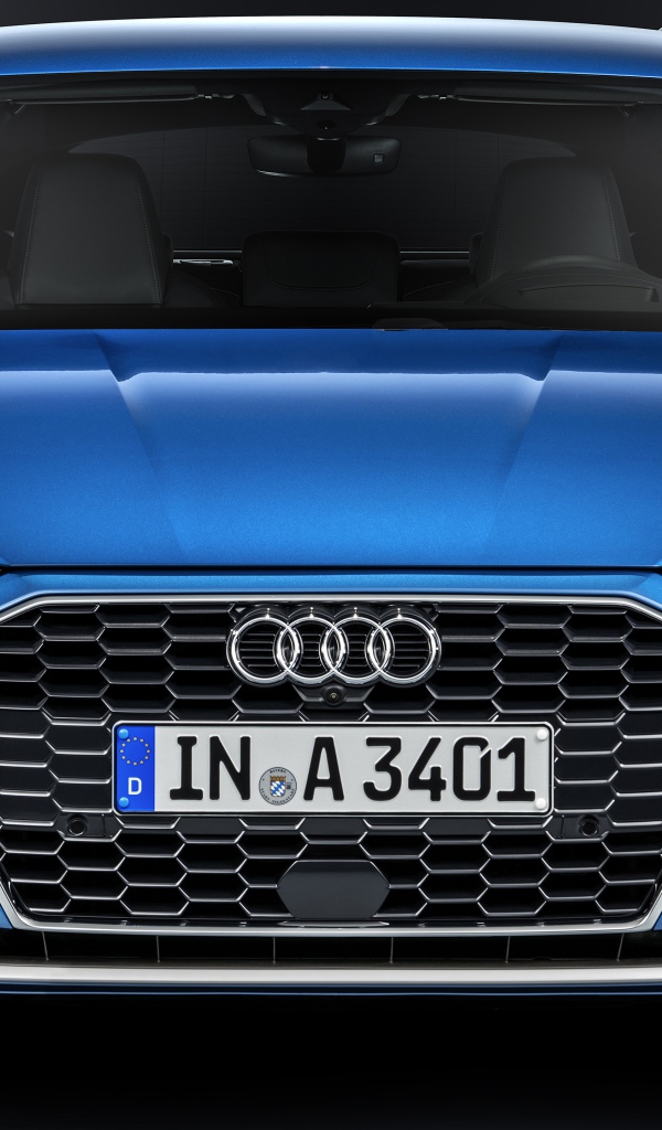 Синий автомобиль Audi A3 Sportback 35 TFSI 2020 года на сером фоне