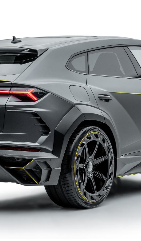 Серый внедорожник Lamborghini Urus 2019 года на белом фоне