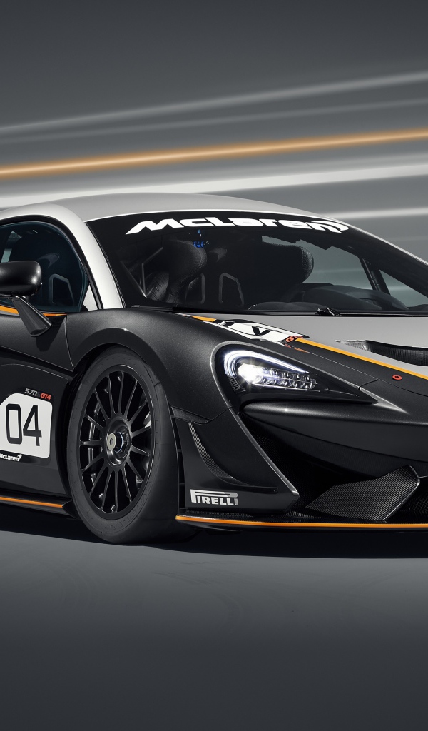 Спортивный автомобиль McLaren 570S GT4 2020 года на сером фоне