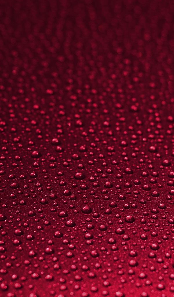 Красный фон с каплями воды 