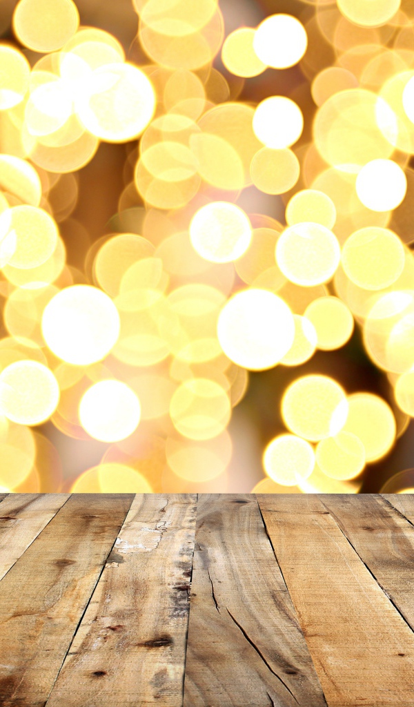 Деревянные доски и золотой фон боке