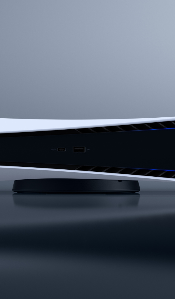 Игровая консоль Playstation 5 на сером фоне