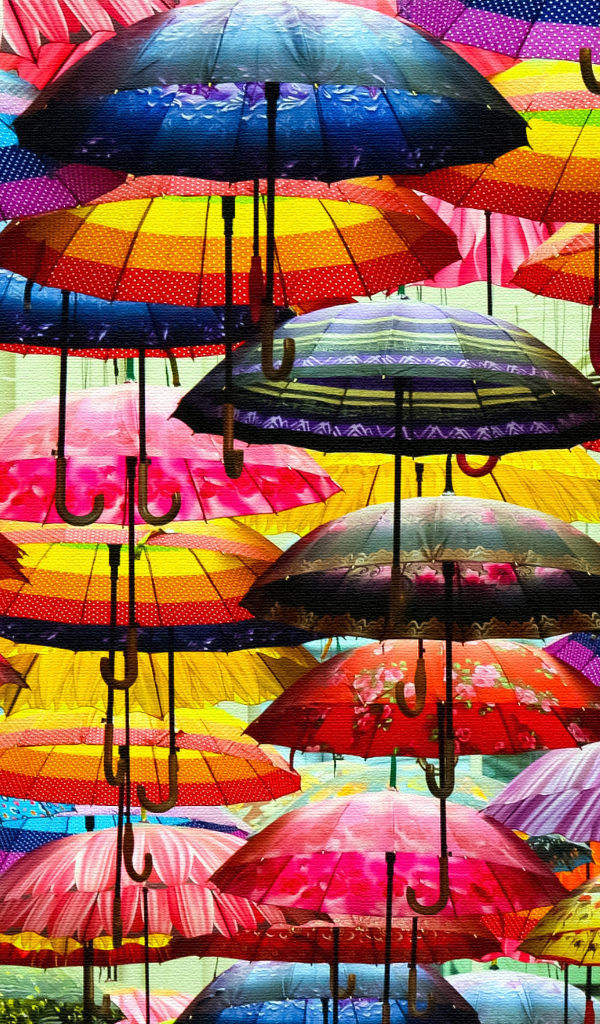 Много разноцветных зонтиком в воздухе