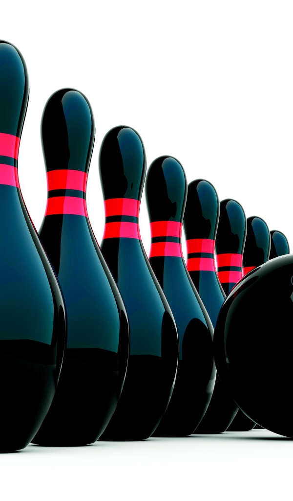 Черные кегли и шар для боулинга на белом фоне