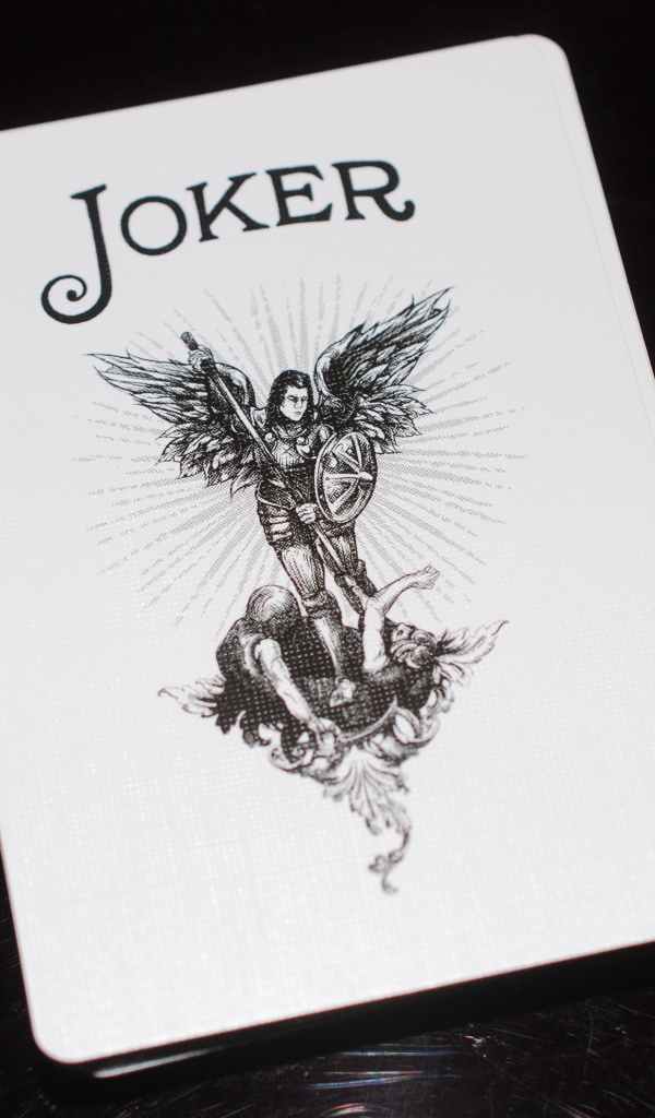 Карта Джокер на черном фоне