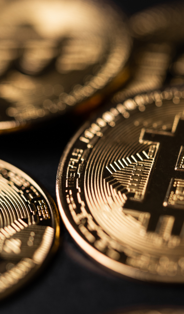 Gold coins bitcoin close up