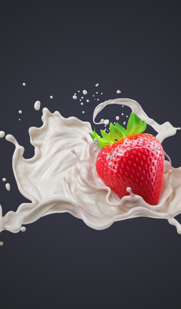 Красная клубника в молоке на сером фоне