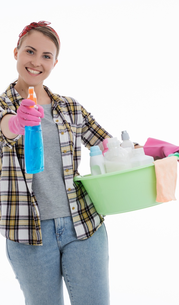 Girl housewife doing the cleaning on a white background