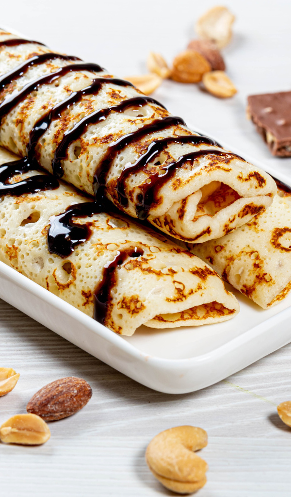 Pancakes with chocolate and nuts for the holiday Maslenitsa 2020