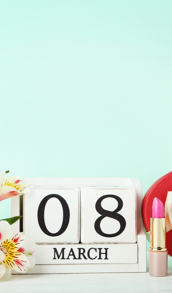 Альстромерия и подарок на голубом фоне на 8 марта