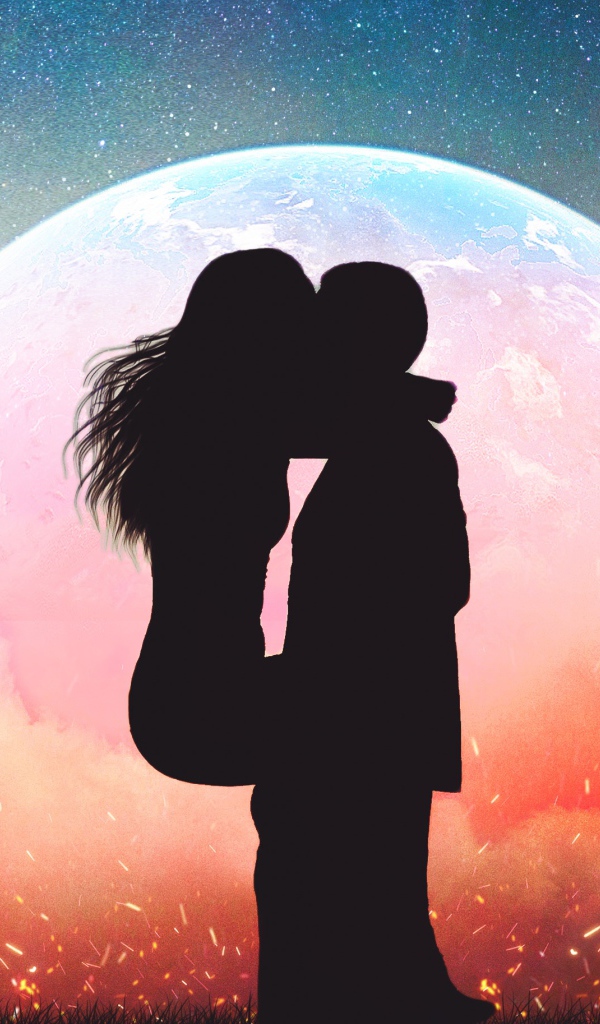 Поцелуй влюбленной пары на фоне планеты ночью 