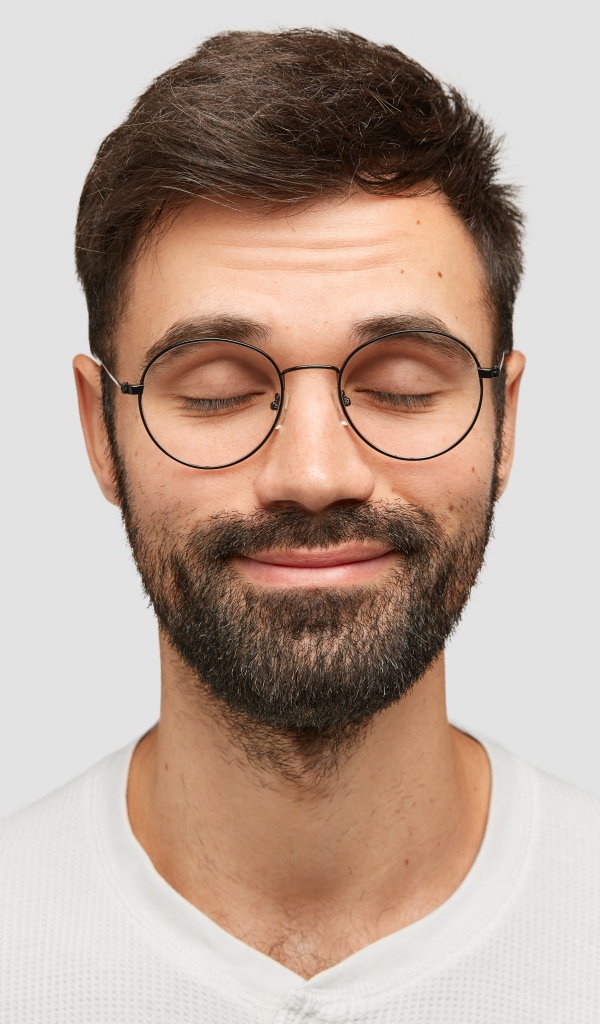 Bearded man with glasses on his face