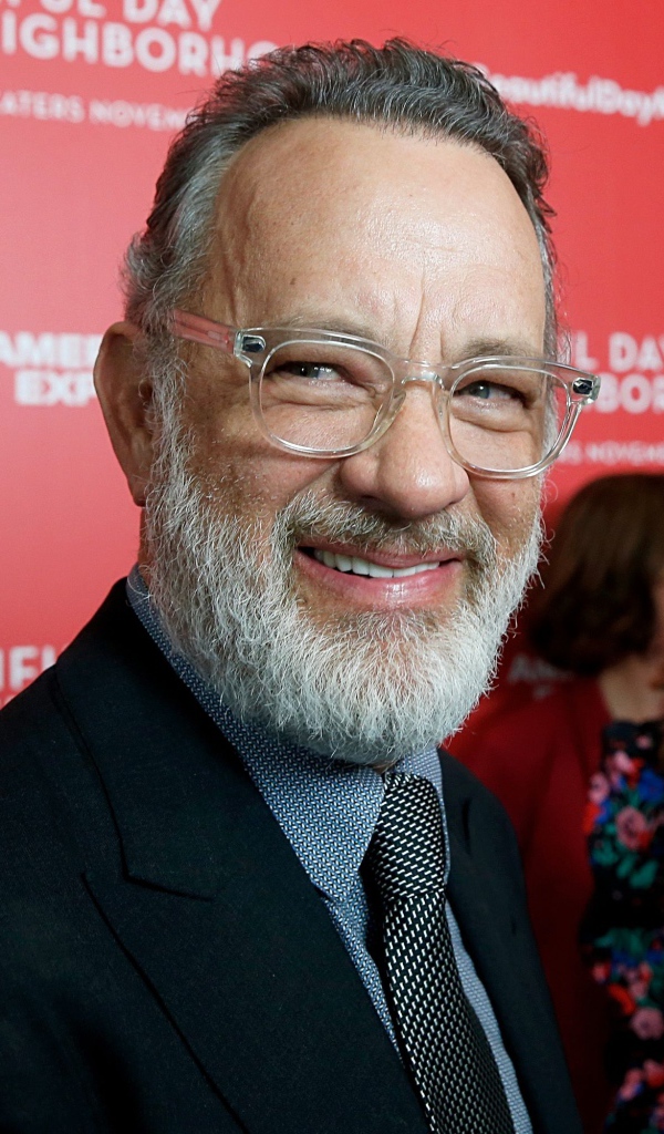 Улыбающийся мужчина, актер Том Хэнкс