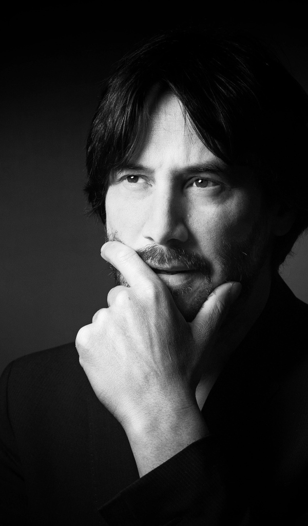 Стильный мужчина, канадский актер Киану Ривз  в костюме