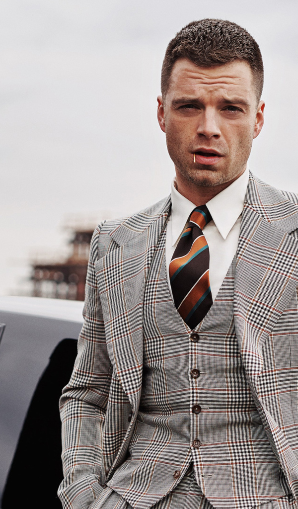 Stylish man, actor Sebastian Stan in a suit