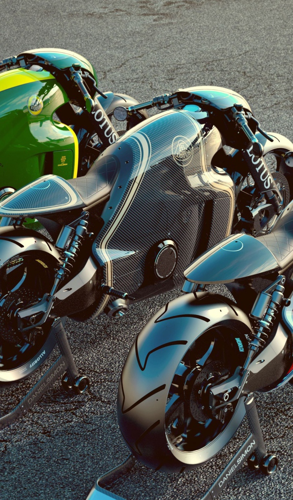 Три мотоцикла Lotus C01 на асфальте 