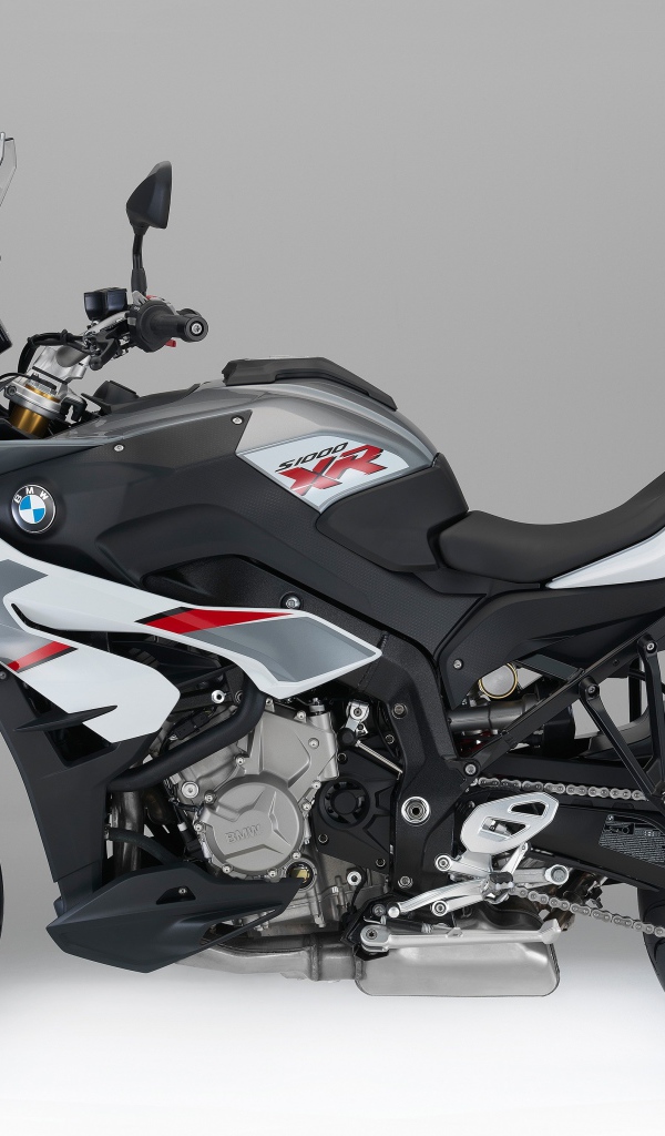 BMW S1000 racing motorcycle on a gray background