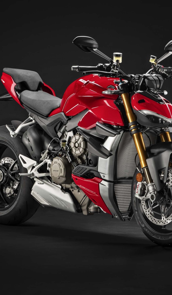 Красный мотоцикл Ducati Streetfighter V4 2020 года на черном фоне