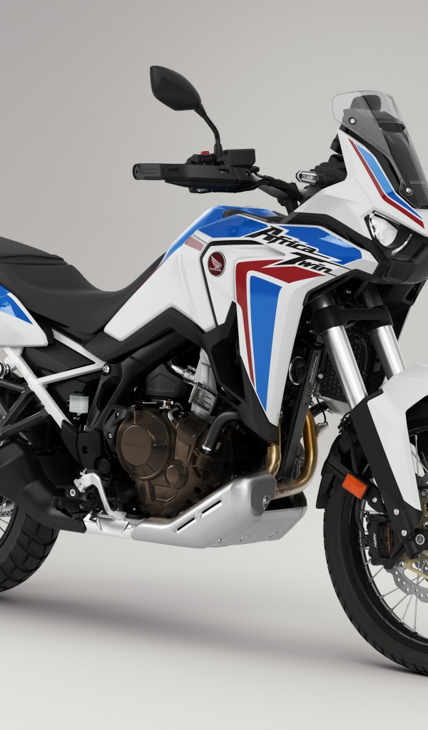 Мотоцикл Honda CRF 1000 D AFRICA TWIN, 2020 года на сером фоне
