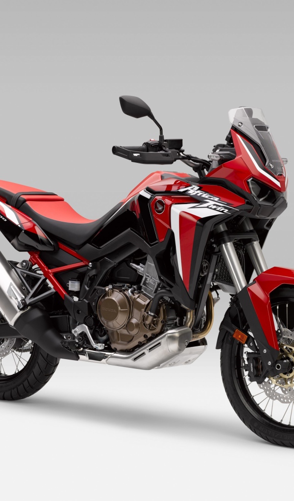 Мотоцикл Honda CRF 1000 D,  2020 года на сером фоне
