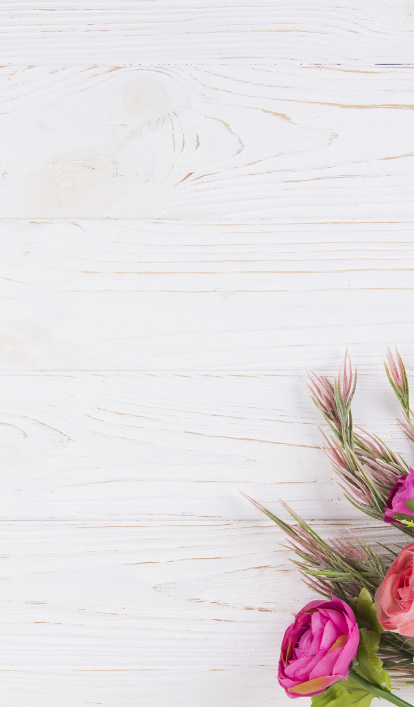 Букет цветов лютиков на деревянном столе