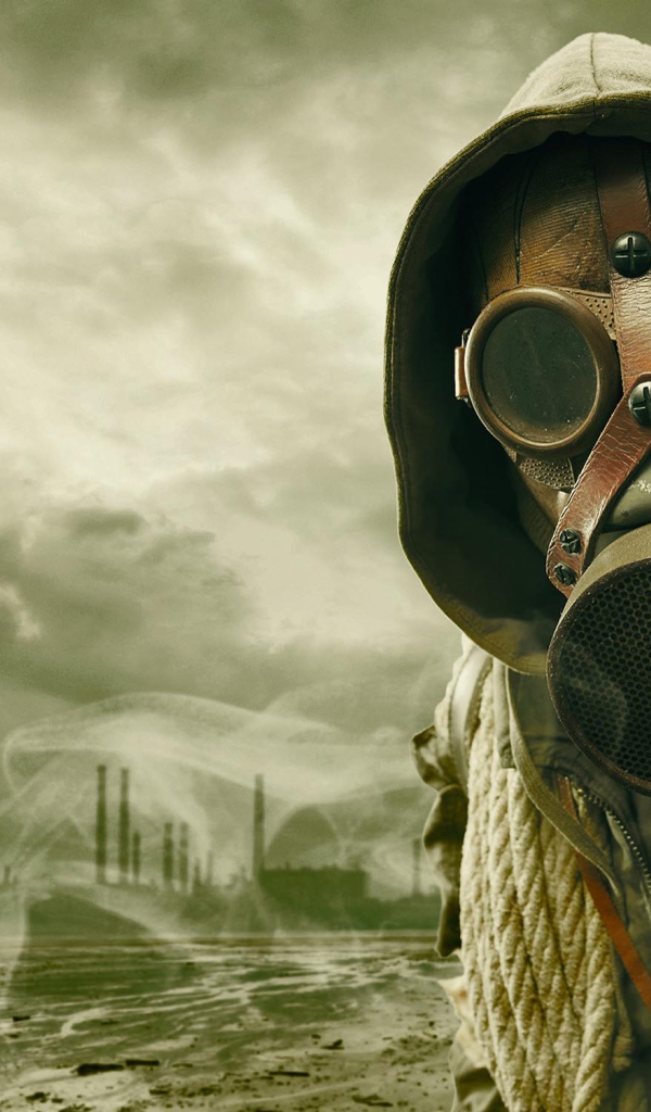 Мужчина в противогазе во вромя пандемии коронавируса 