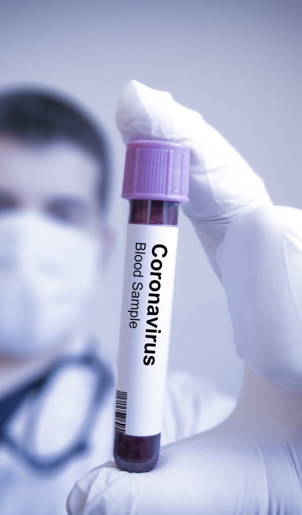Анализ на коронавирус covid-19 в пробирке в руке
