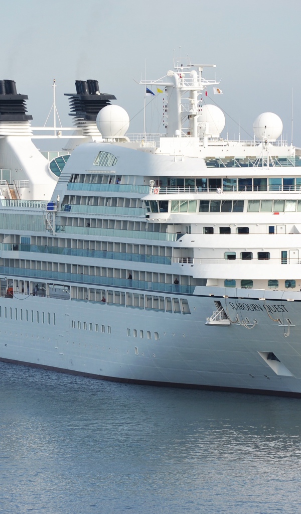 Large white cruise ship SEABOURN QUEST at sea