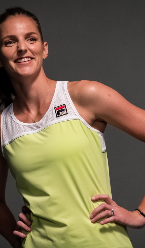 Czech tennis player Karolina Plishkova on a gray background