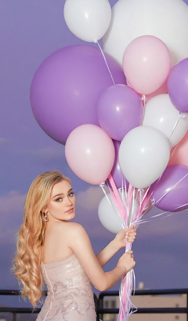 American actress Meg Donnelly with balloons