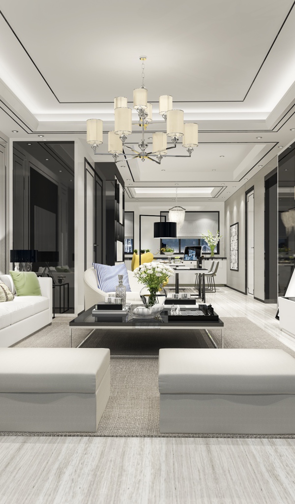 Большая просторная гостиная комната с белой кожаной мебелью