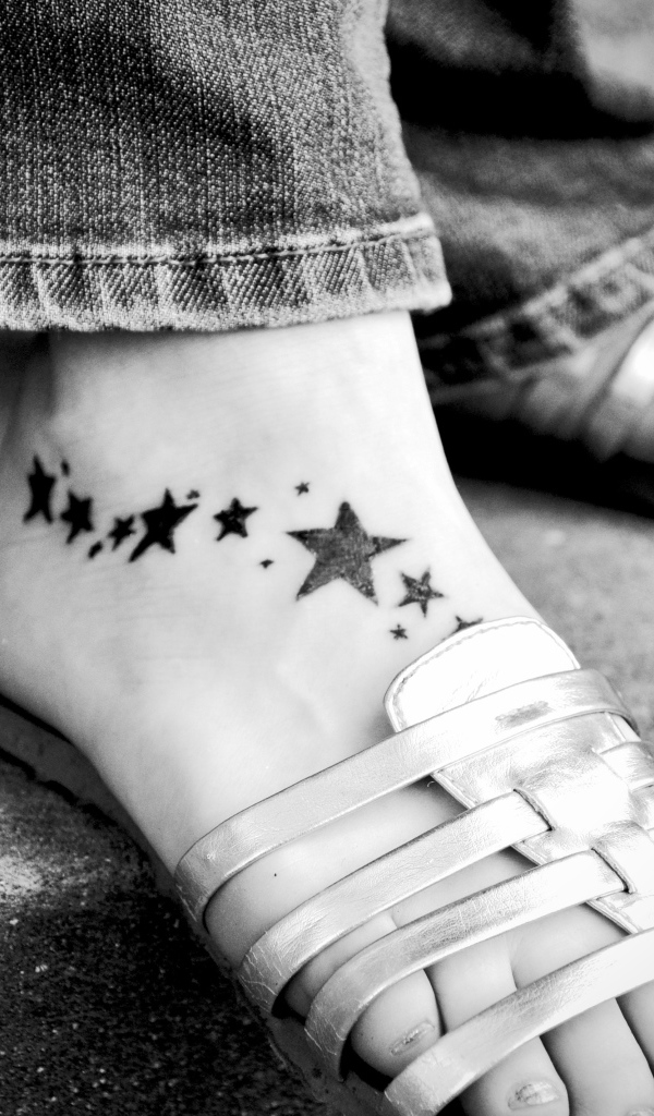 Star tattoo on girl's leg