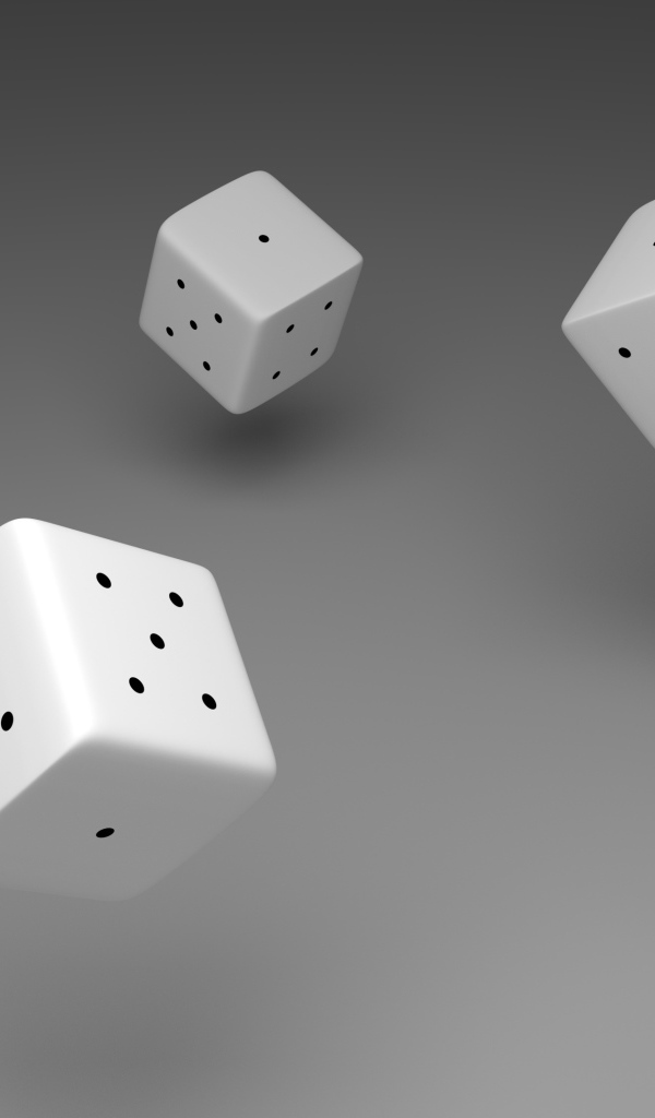 Белые игральные кости в воздухе на сером фоне