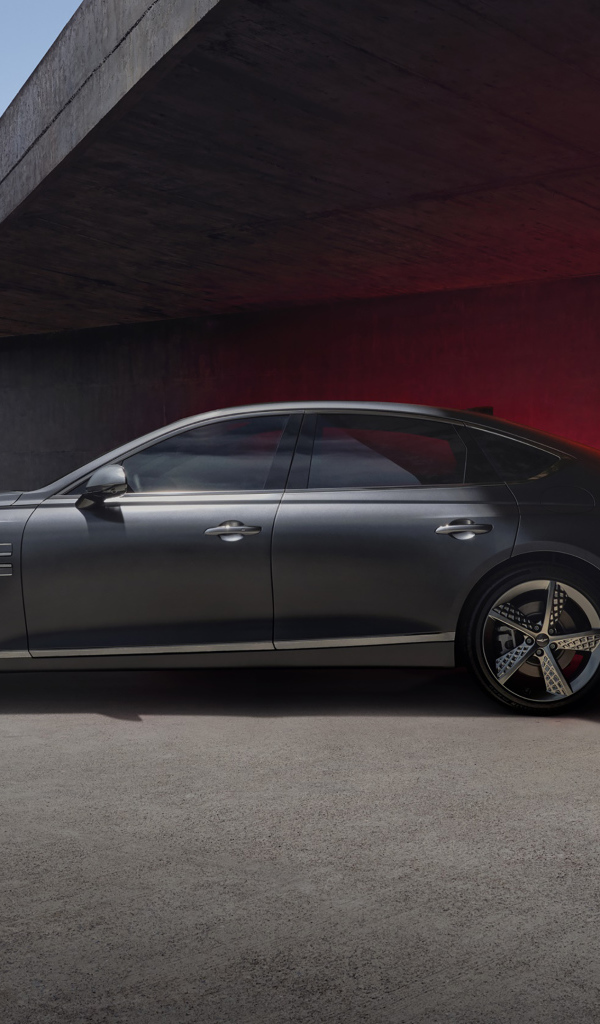 Вид сбоку на автомобиль Genesis G80 Sport 2021 года