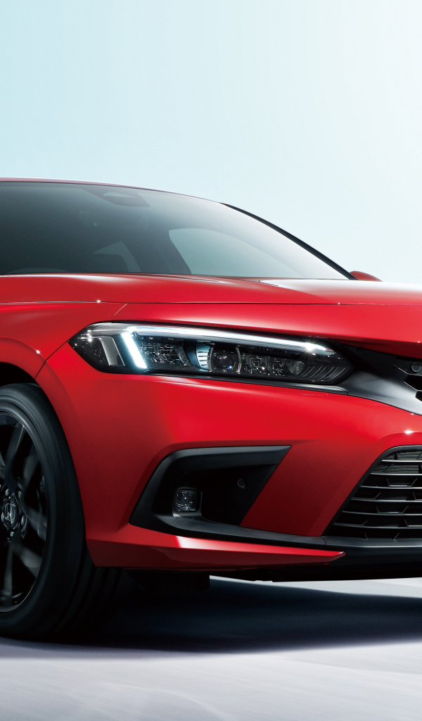 Красный автомобиль Honda Civic Hatchback 2021 года
