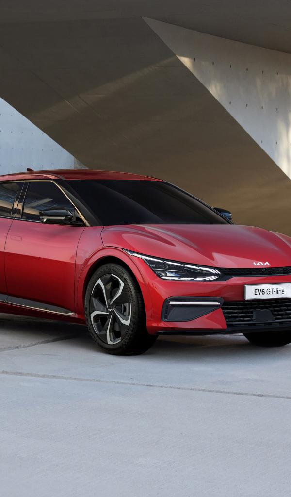 Красный автомобиль Kia EV6 GT Line 2021 года