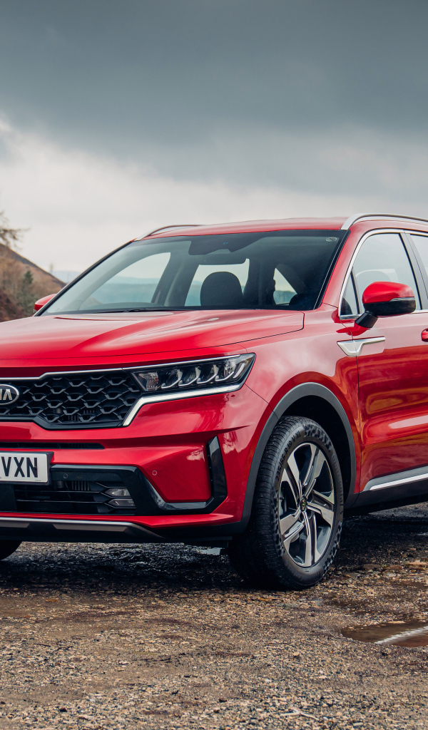 Красный внедорожник Kia Sorento Plug-In Hybrid 2021 года