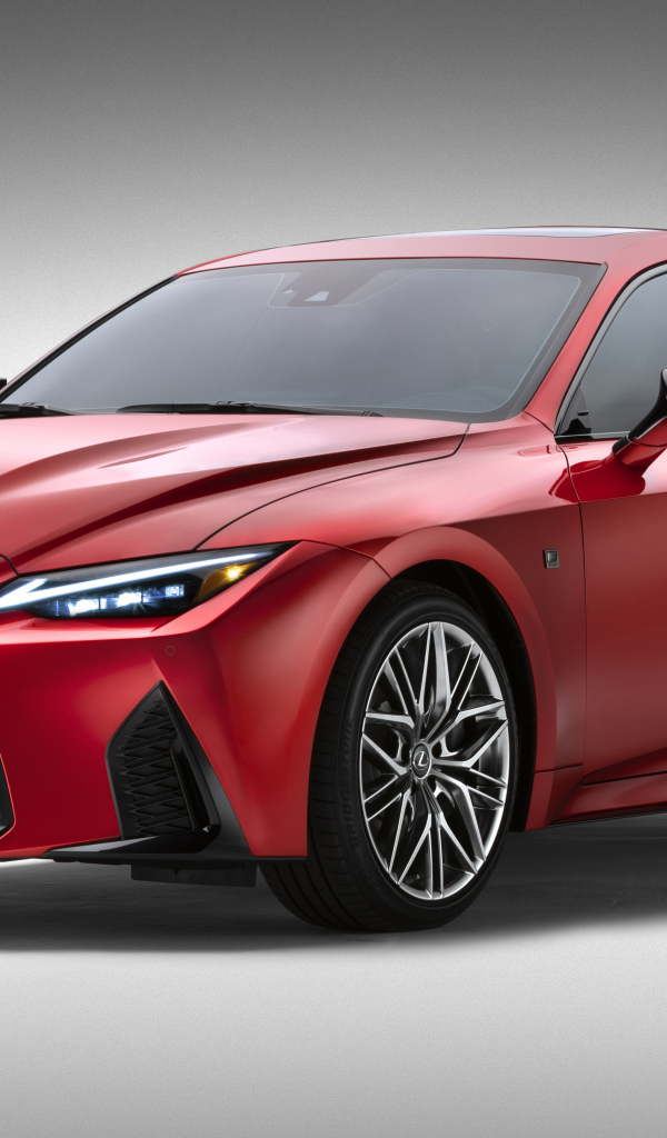 Красный Lexus IS 500 F SPORT Performance, 2022 года на сером фоне