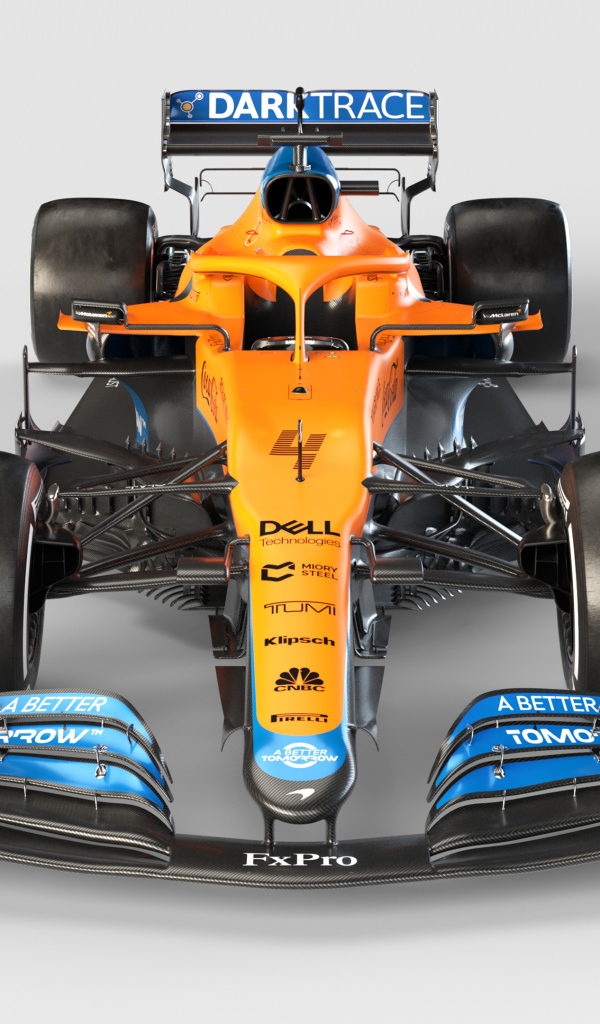 Гоночный автомобиль McLaren MCL35M 2021 года на сером фоне