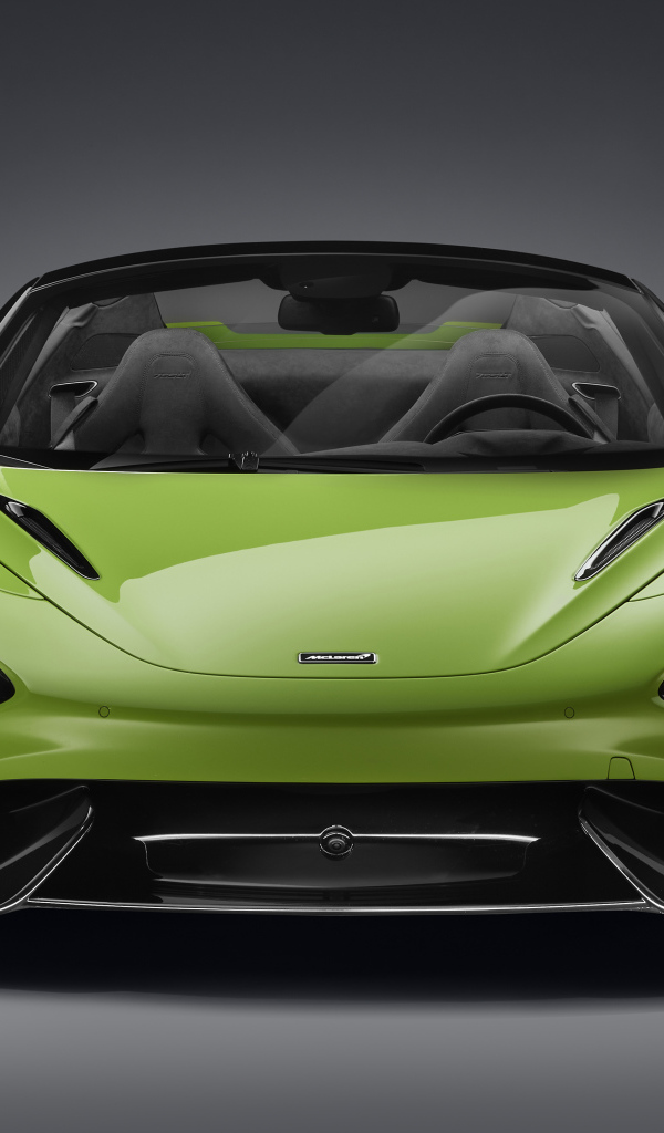 Зеленый McLaren 765LT Spider 2022 года а сером фоне 