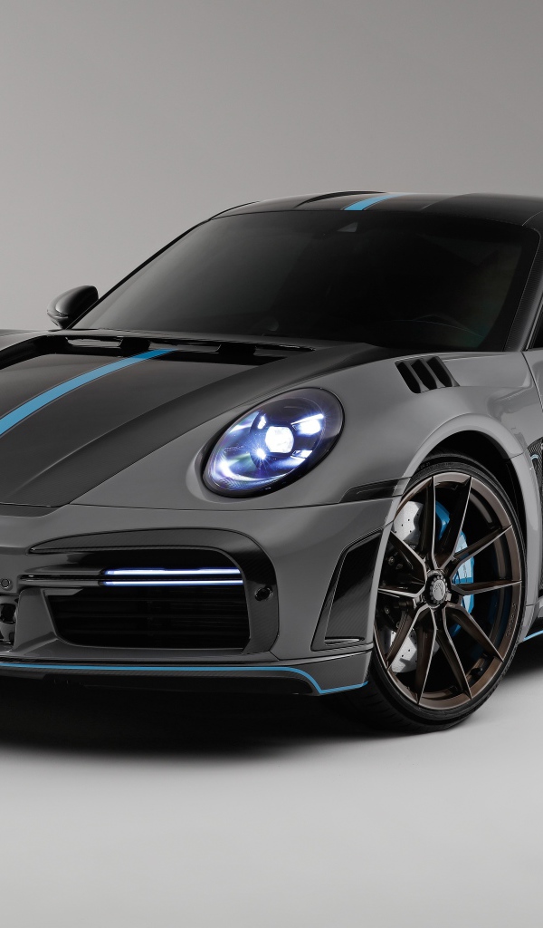 Спортивный автомобиль Porsche 911 Turbo S Stinger GTR 3 2021  года на сером фоне