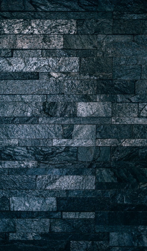 Черная гранитная стена крупным планом 