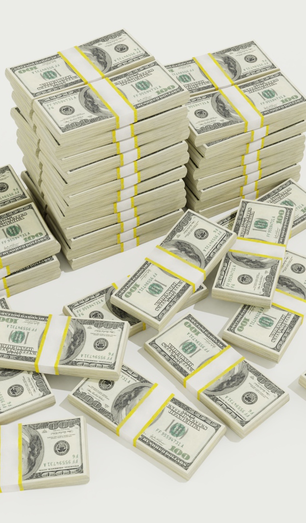 Пачки долларов на белом фоне