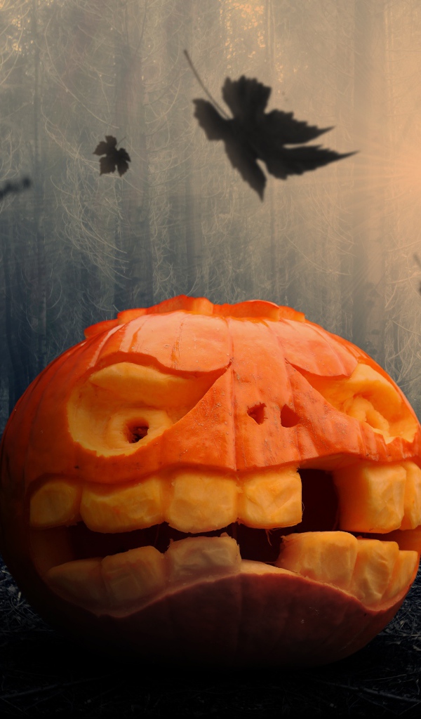 Гримаса из тыквы на праздник Хэллоуин