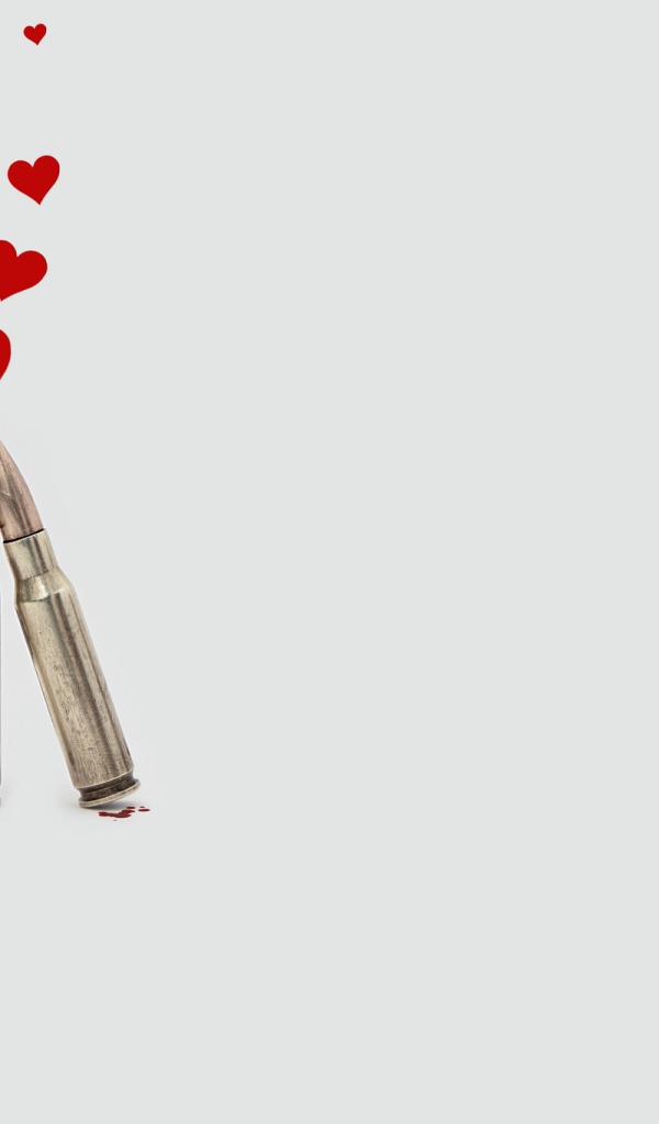 Два патрона с сердечками на сером фоне